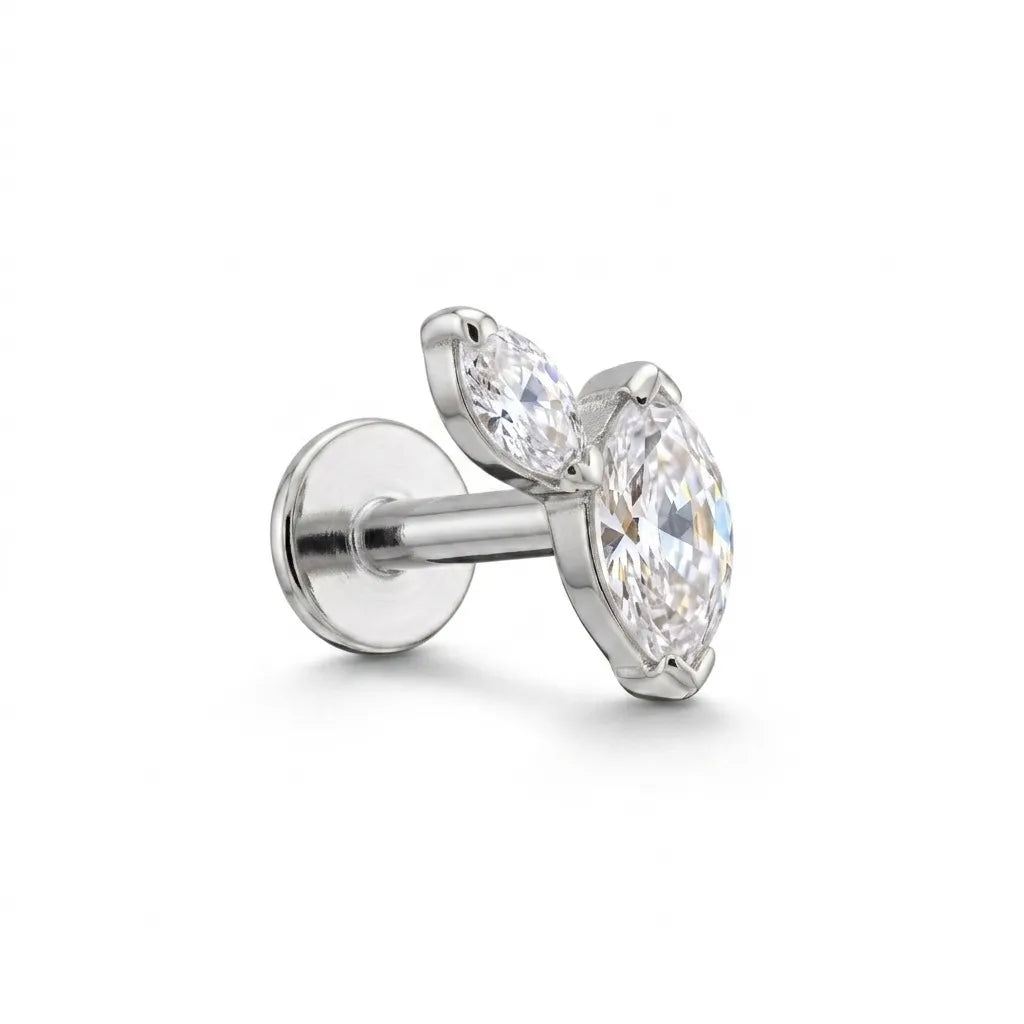 A pair of silver-toned stud earrings with marquise-cut clear gemstones, shown on a clean white background.