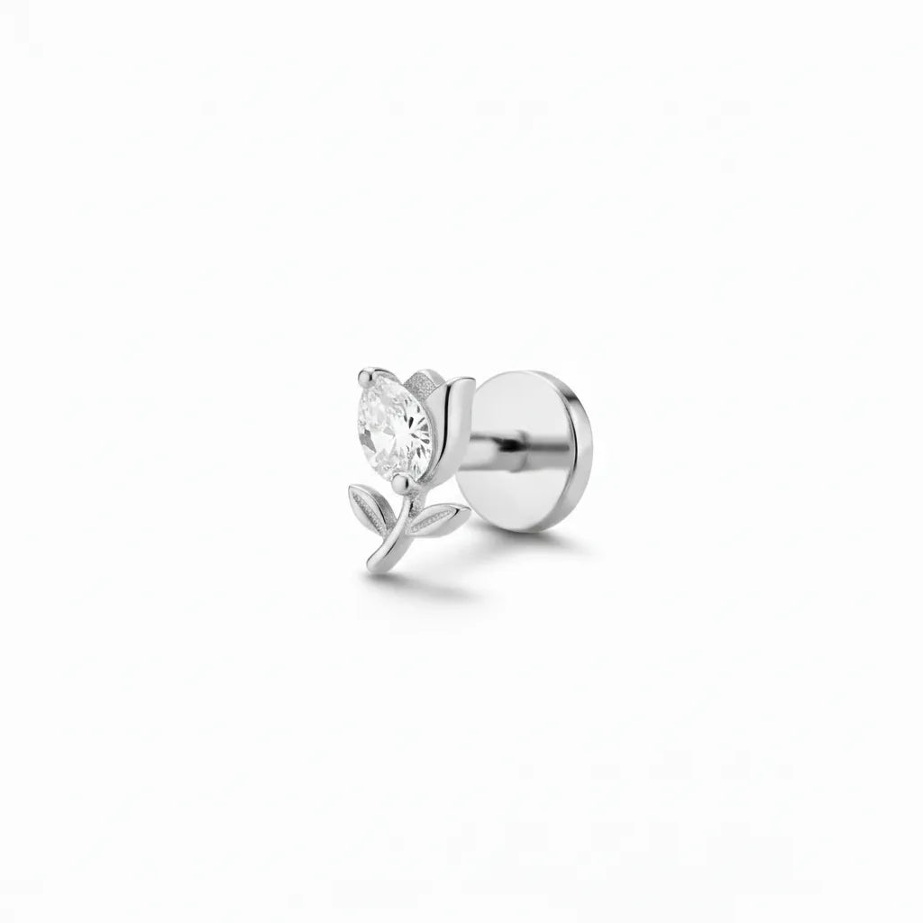 Silver tulip tragus on a white background