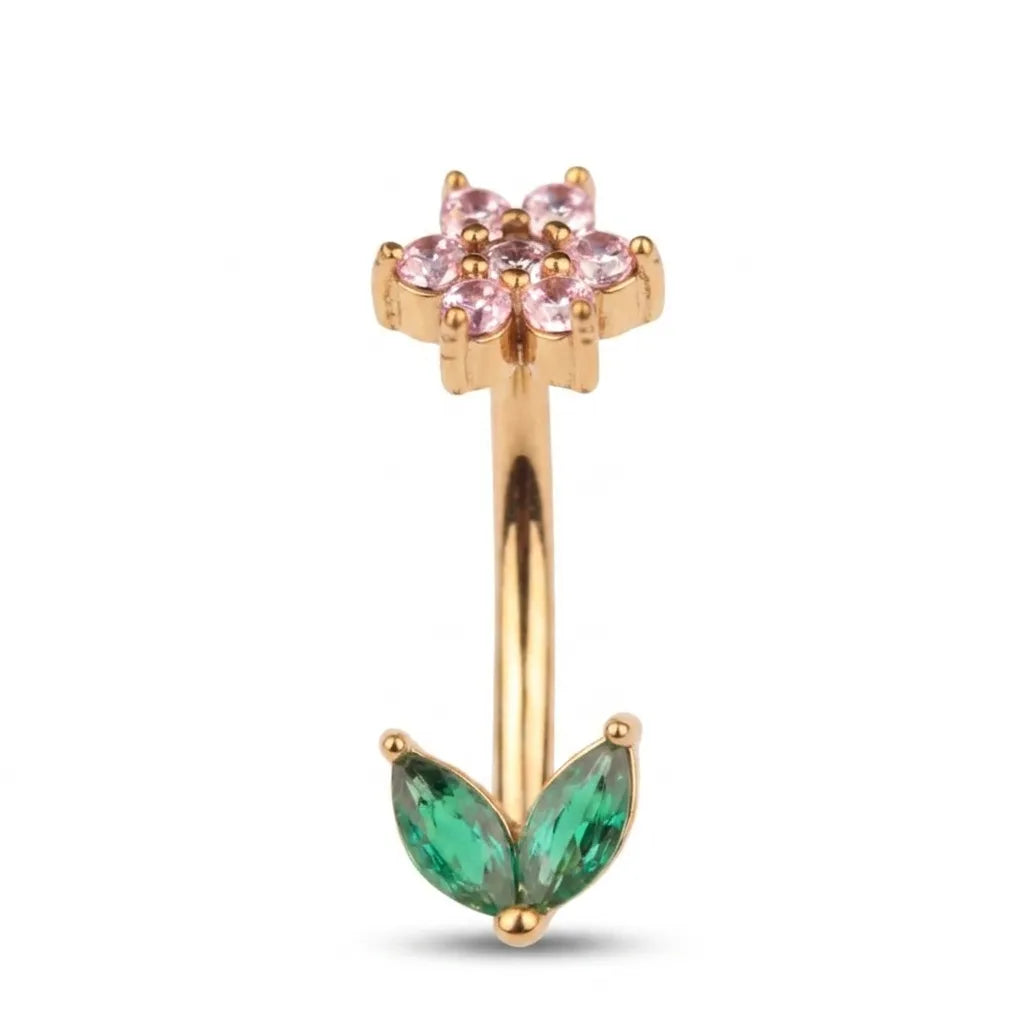 Gold nose ring with pink and green gemstones on a white background