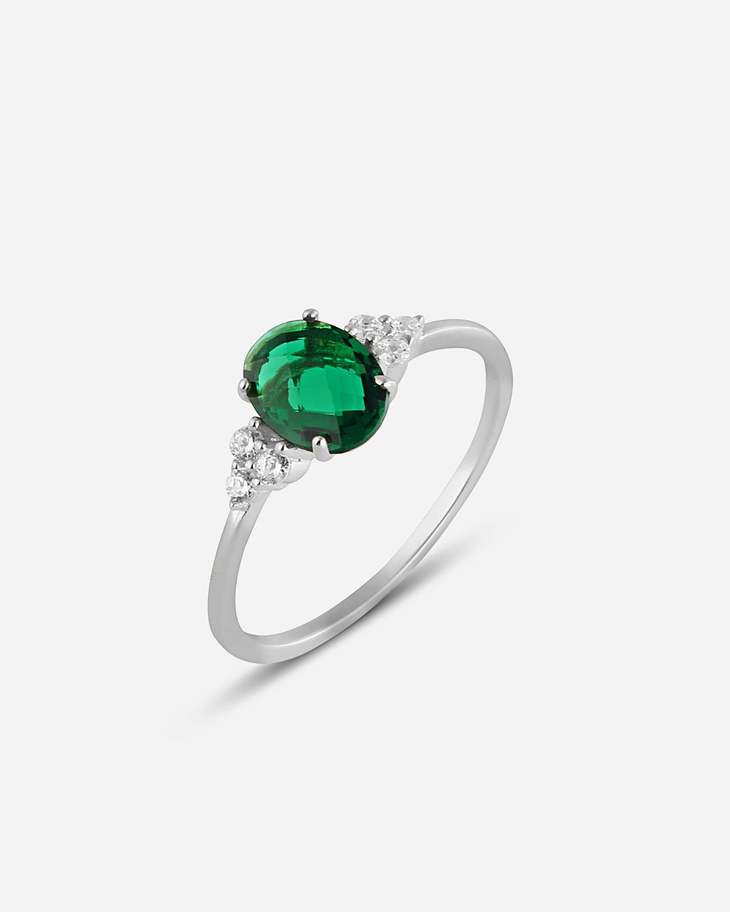 Silver Side Stone Emerald Shaped Emerald Ring