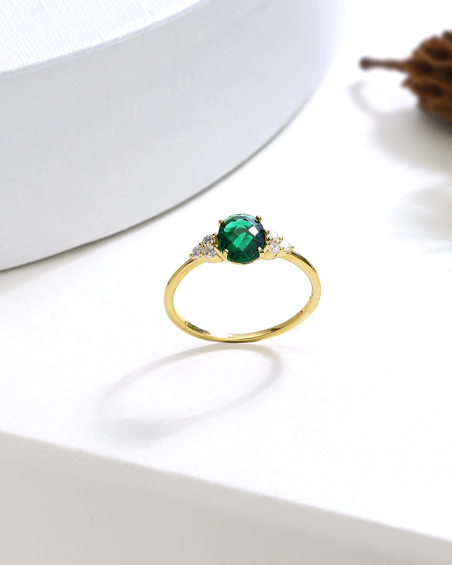 Silver Side Stone Emerald Shaped Emerald Ring