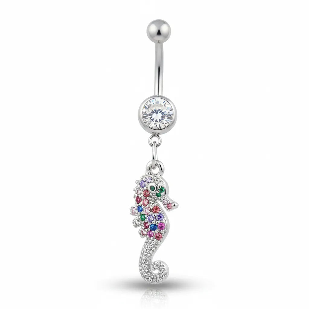 Seahorse-shaped belly button ring with colorful gemstones on a white background