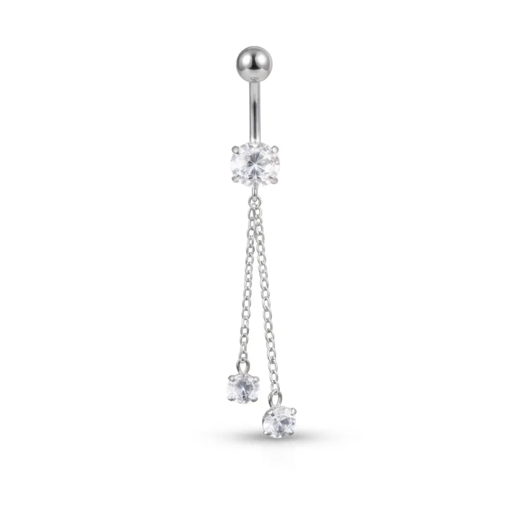 A silver-toned belly button ring featuring a single ball barbell, a central flower-shaped clear gemstone, and two dangling chain drops ending in smaller flower-shaped clear gemstones, shown on a plain white background.
