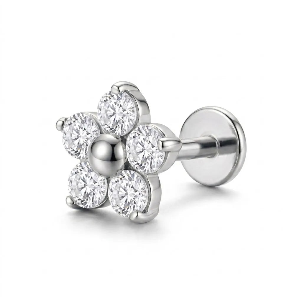 A silver flower-shaped stud earring featuring five clear round-cut gemstones, with a polished metallic ball at the center and a flat round post with a butterfly back, shown on a white background.