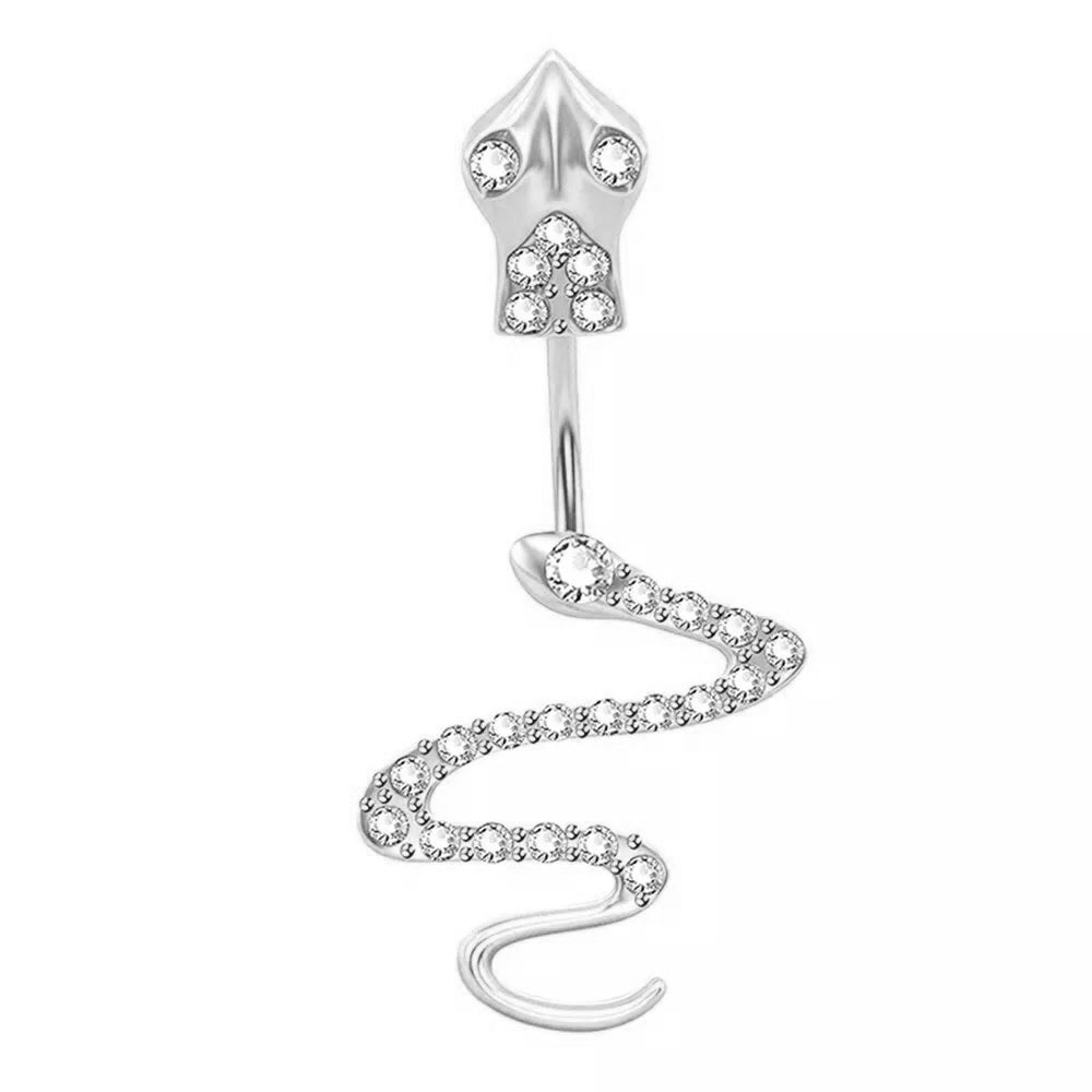 A silver-toned curved barbell belly button piercing featuring a skull-shaped top adorned with clear rhinestones and a snake-shaped lower bar also lined with clear rhinestones, set against a plain white background.